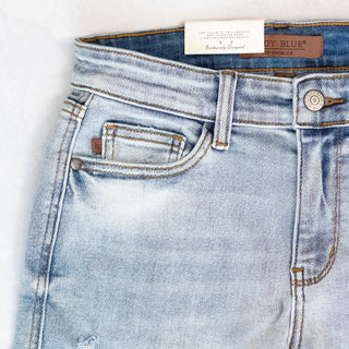 Judy Blue Light Distressed Denim Shorts with Mid Rise Waist - Bennett Avenue Boutique