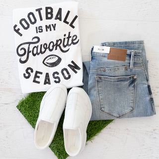 Football Is My Favorite Season Game Day Graphic Tee with jeans and white slip-on shoes