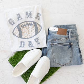 Game Day Leopard Football Graphic Tee with jeans and white slip-on shoes