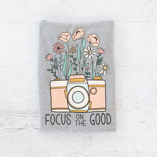 Focus on the Good heather grey graphic tee with camera and wildflower illustration
