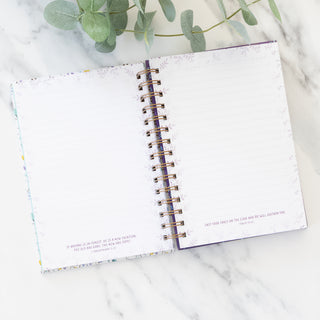 Open I Can Do All This Through Him Who Gives Me Strength journal with lined pages and floral borders