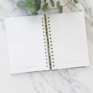 Open He Has Made Everything beautiful in it Time Journal with lined pages and scripture verses on marble background
