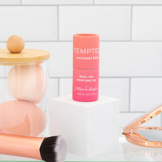 Mixologie Tempted Coconut Kiss roll on perfume oil with makeup sponges and brush