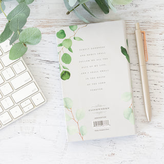 He Restores My Soul Psalm 23:3 Goodness and Mercy notepad with eucalyptus design on a white desk with a pen