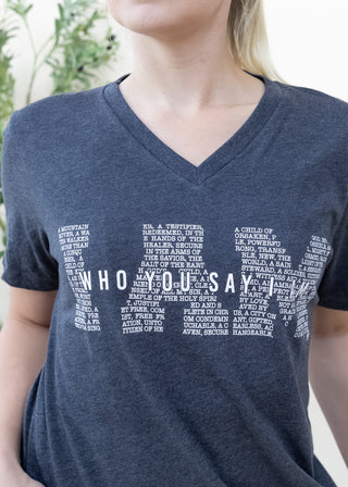 Heather black V-neck I Am Who You Say I Am graphic tee with white text