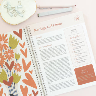 Open page of The Bible in A Year A 52-Week Journey Through Gods Word featuring Marriage and Family reading plan