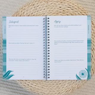 Open Proverbs The Bible Study Collective All in One Inductive Study journal on woven surface, showing reflection and application prompts