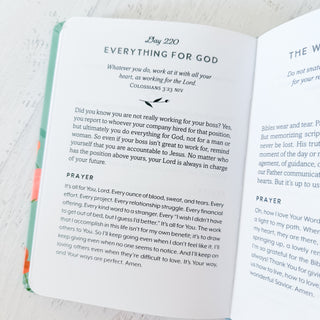 Open book with text and prayer on a light background