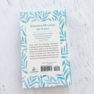 Bookback with blue leaf pattern and text on a light gray background