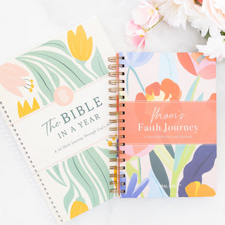 The Bible In A Year and Moms Faith Journey spiral bound journals with floral covers